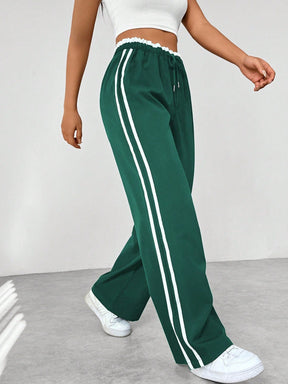 Sanne | Dames sportieve wide-leg broek met zijstrepen en trekkoord