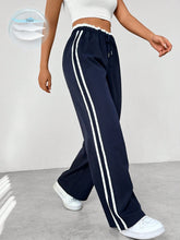 Sanne | Dames sportieve wide-leg broek met zijstrepen en trekkoord